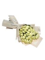 Elegant white roses Valentine’s bouquet wrapped in white by Flowsent – flower delivery in Cairo and Giza
