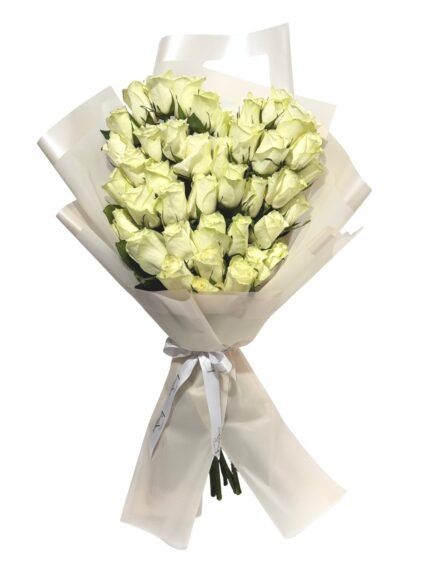 Elegant white roses Valentine’s bouquet wrapped in white by Flowsent – flower delivery in Cairo and Giza