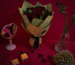 Classic red roses bouquet wrapped in vintage paper by Flowsent – Valentine’s flower delivery in Cairo and Giza