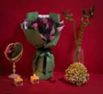 Lovely Valentine’s bouquet of red and white roses with limonium by Flowsent – flower delivery in Cairo and Giza